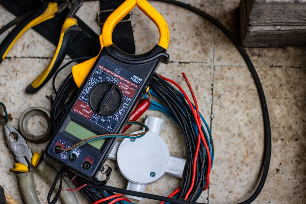 Clamp meter and hand tools used for electrical diagnostics